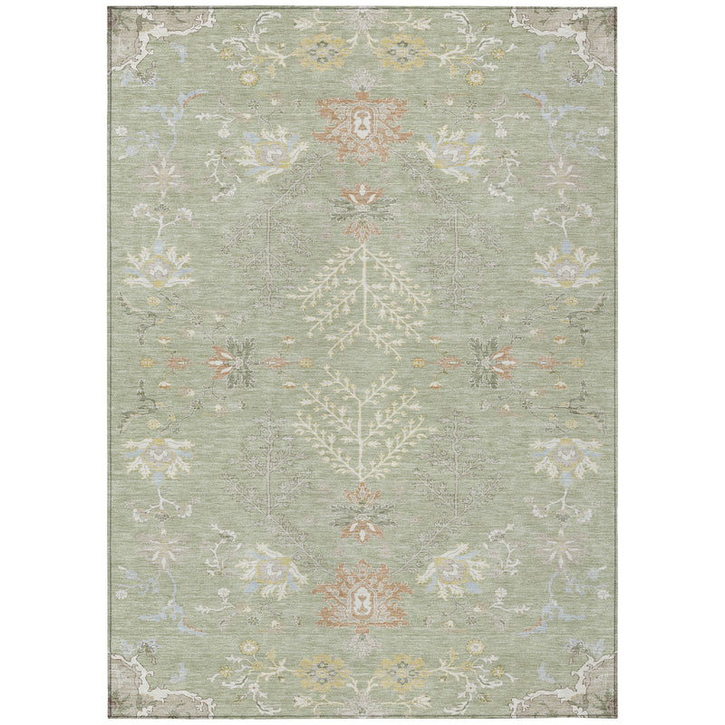 Rectangular green area rug with ivory scrolling floral motifs and medallion center