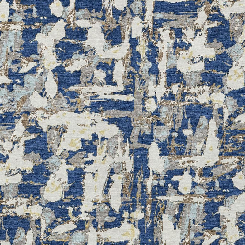 Navy and beige abstract area rug with vertical streaks and speckled texture