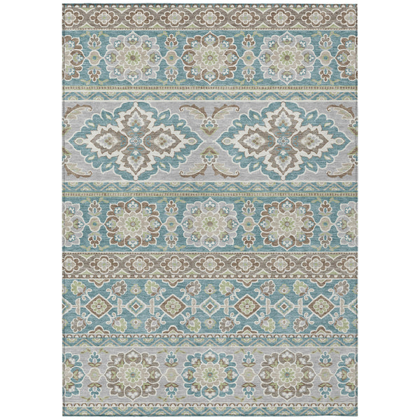 Teal and green tribal patterned indoor outdoor area rug with washed medallion stripes