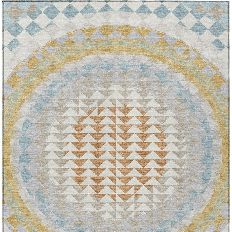 Area rug central medallion with ivory field, light blue accents, and gold-trimmed zigzag chevrons.