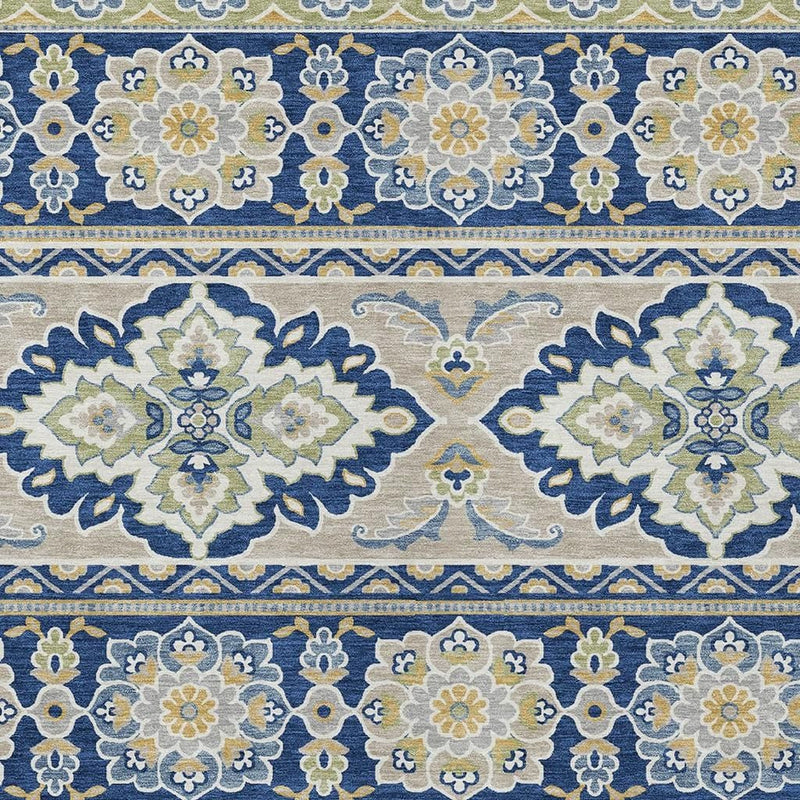 Navy and beige tribal area rug with repeating octagon floral medallions and borders