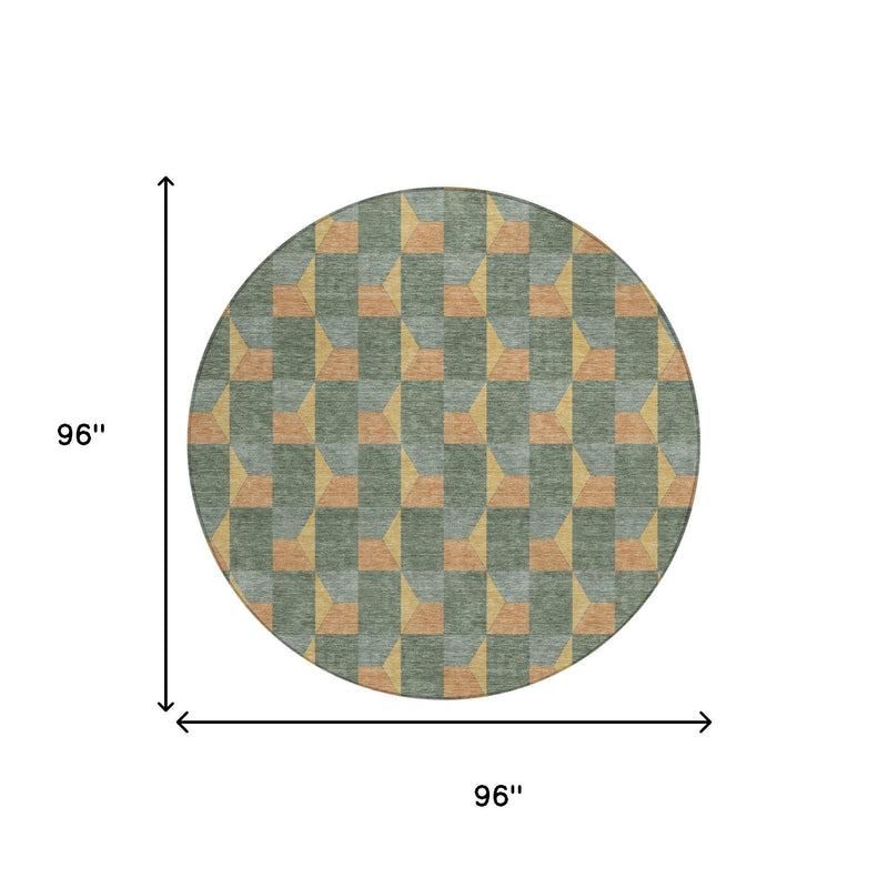 Round green-gray area rug, 96 in diameter, with tan, yellow, and orange geometric pattern
