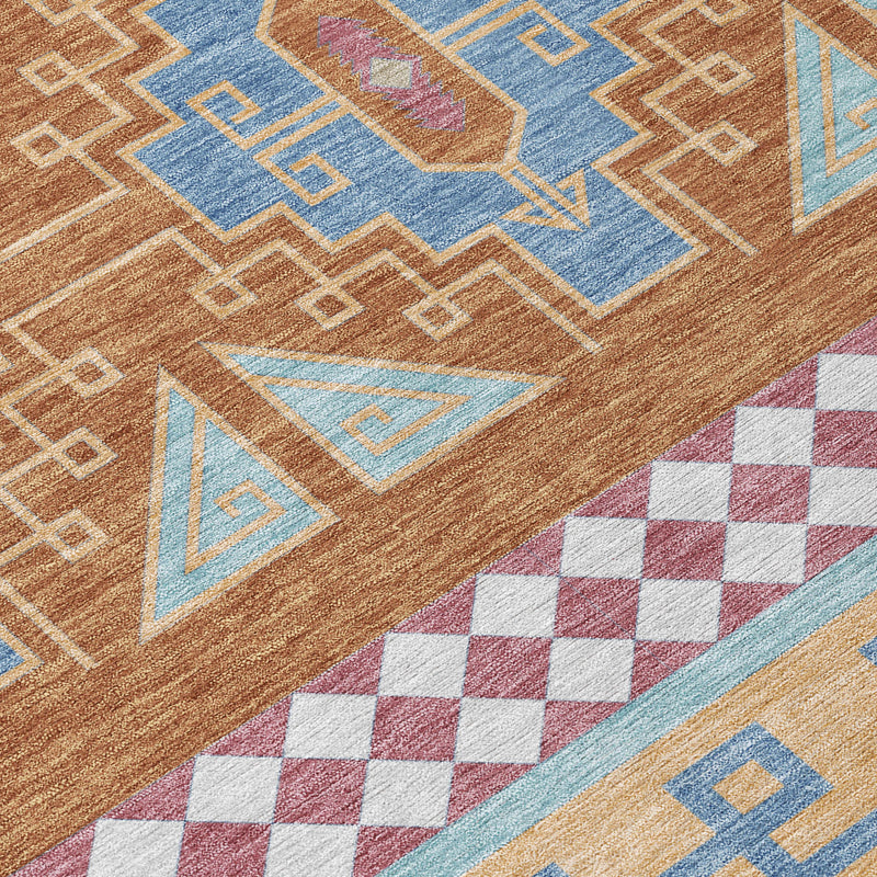 Tribal area rug close-up with tan base, blue and aqua motifs, and maroon check border
