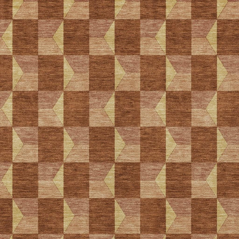 Detailed view of geometric rug pattern in brown, tan, and pale yellow-cream blocks