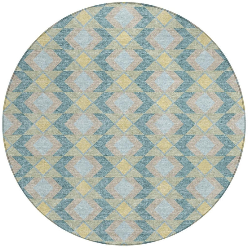 Round area rug with light blue, pale yellow, and beige geometric diamond pattern