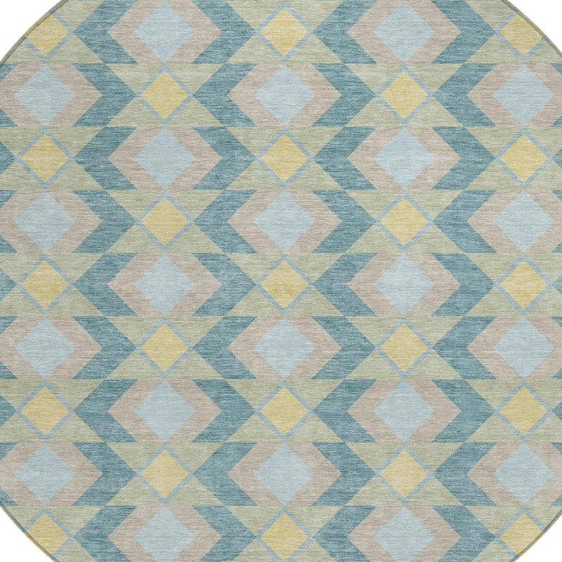 Round area rug close-up with blue, light yellow, and beige geometric zigzag pattern
