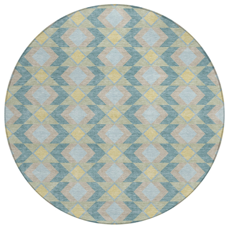 Round area rug with light blue, yellow, beige, and off-white diamond geometric pattern