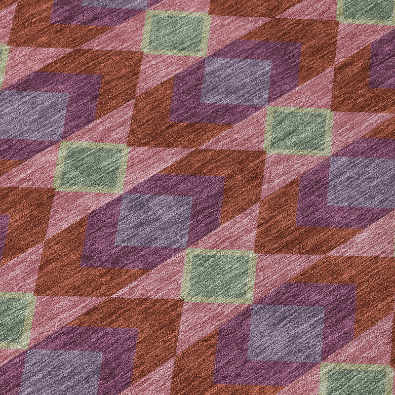 Detail view of geometric cube-like diamonds on burgundy and pewter gray rug