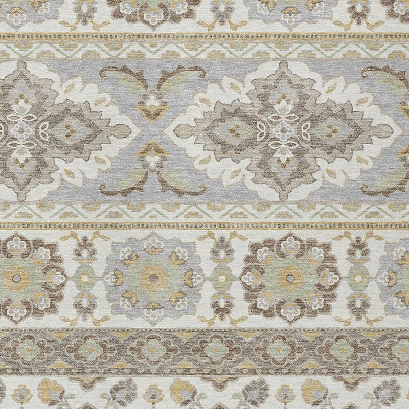 Close-up of ivory and silver tribal rug pattern with floral medallions and stripes