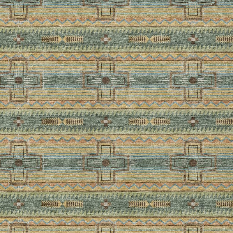 Close-up of turquoise, green, and tan tribal geometric area rug pattern