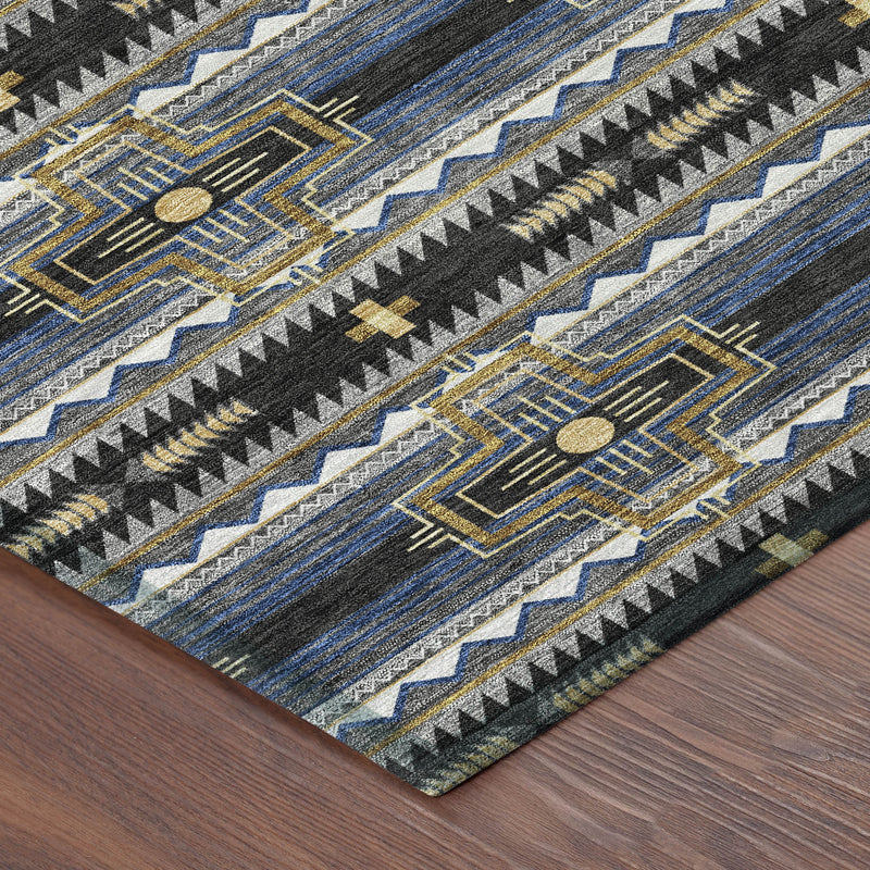 Tribal area rug corner view with dark base, blue lines, and gold-and-cream geometric accents.