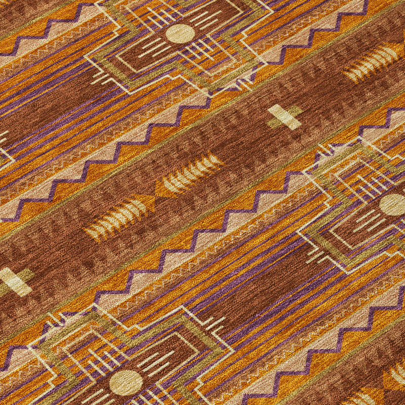 Close-up of brown tribal rug with blue stripe, gold details, and dot accents.