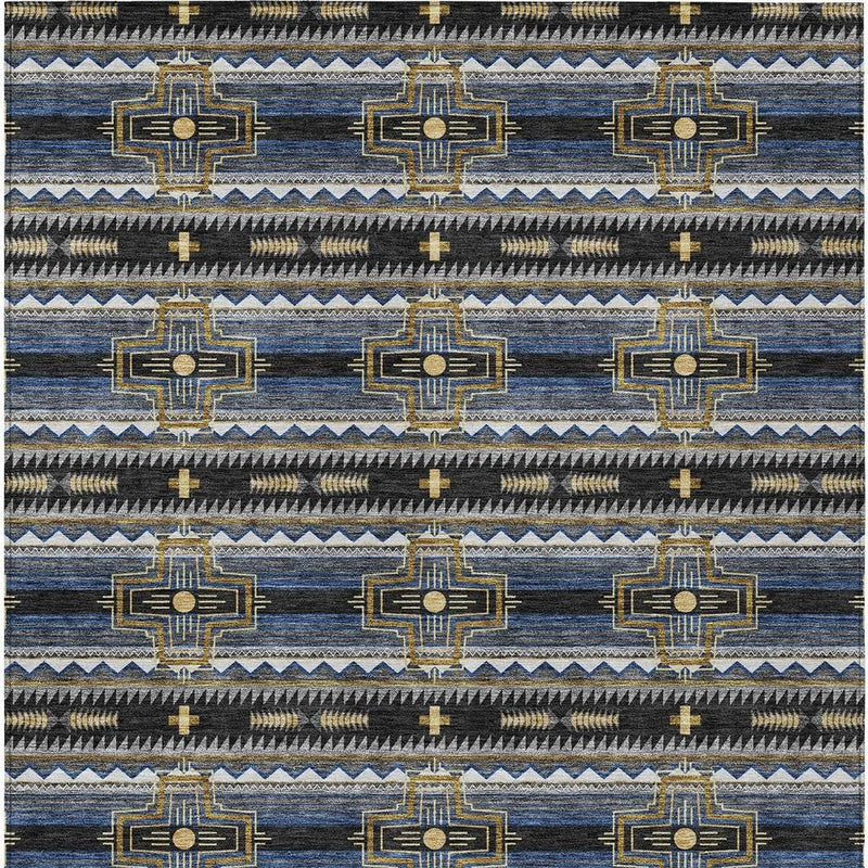 Tribal area rug flat lay with repeating cross motifs in blue, gold, and cream