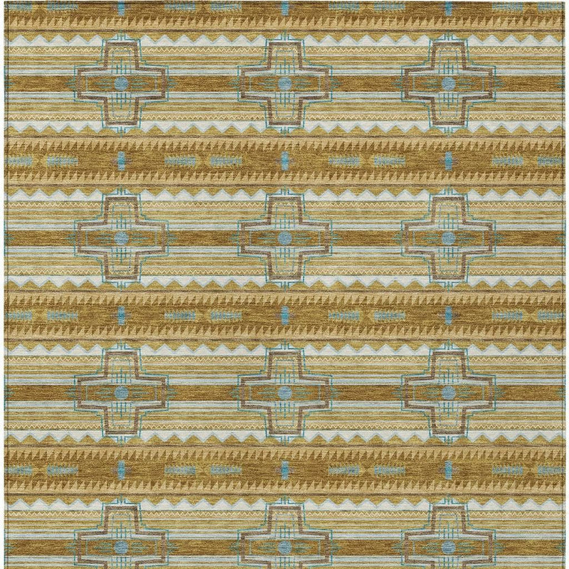 Tan tribal rug with repeating cross and stripe motifs in blue and gold