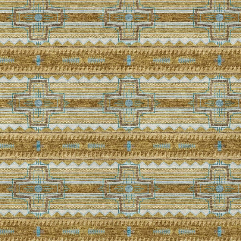 Close-up of tan area rug with blue and gold tribal geometric motif lines