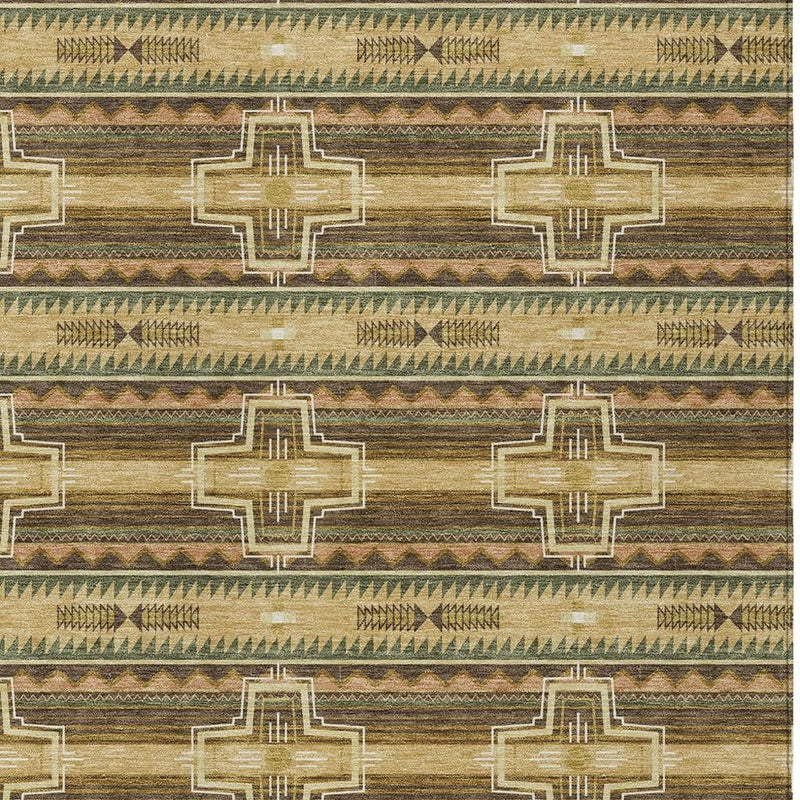 Tribal area rug showing repeating cross medallion motifs in gold, tan, and dark green