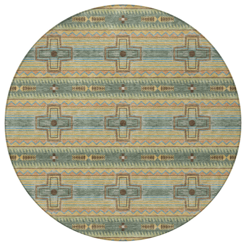 Round area rug with layered green, beige, and teal tribal medallion design