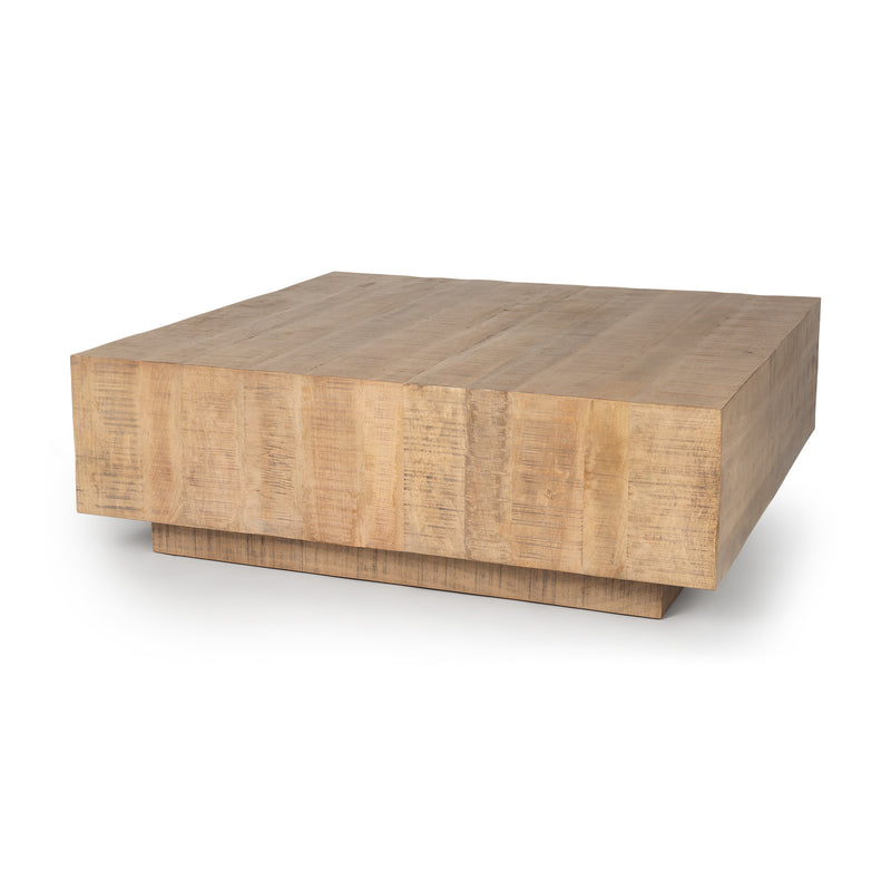 Light wood square block coffee table on a low base