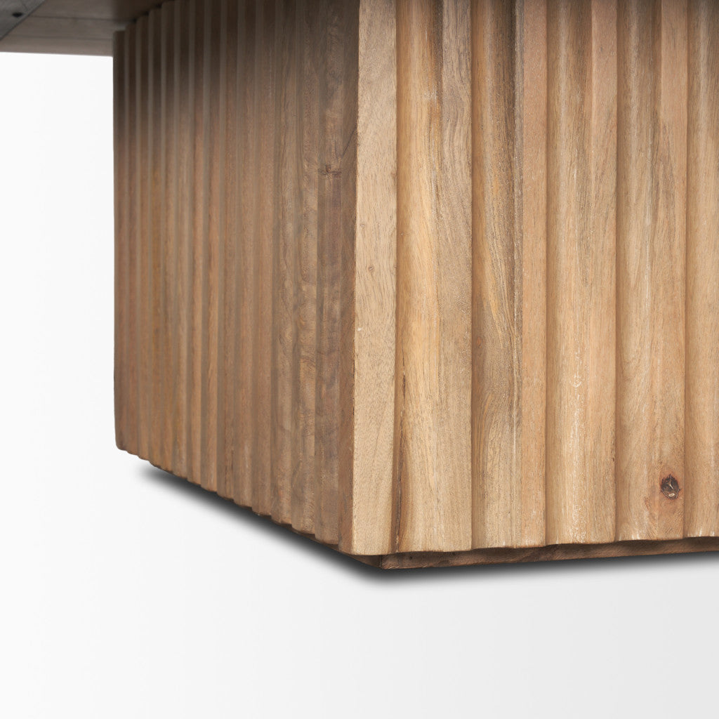 Close-up of light brown solid wood coffee table corner with vertical slatted panels
