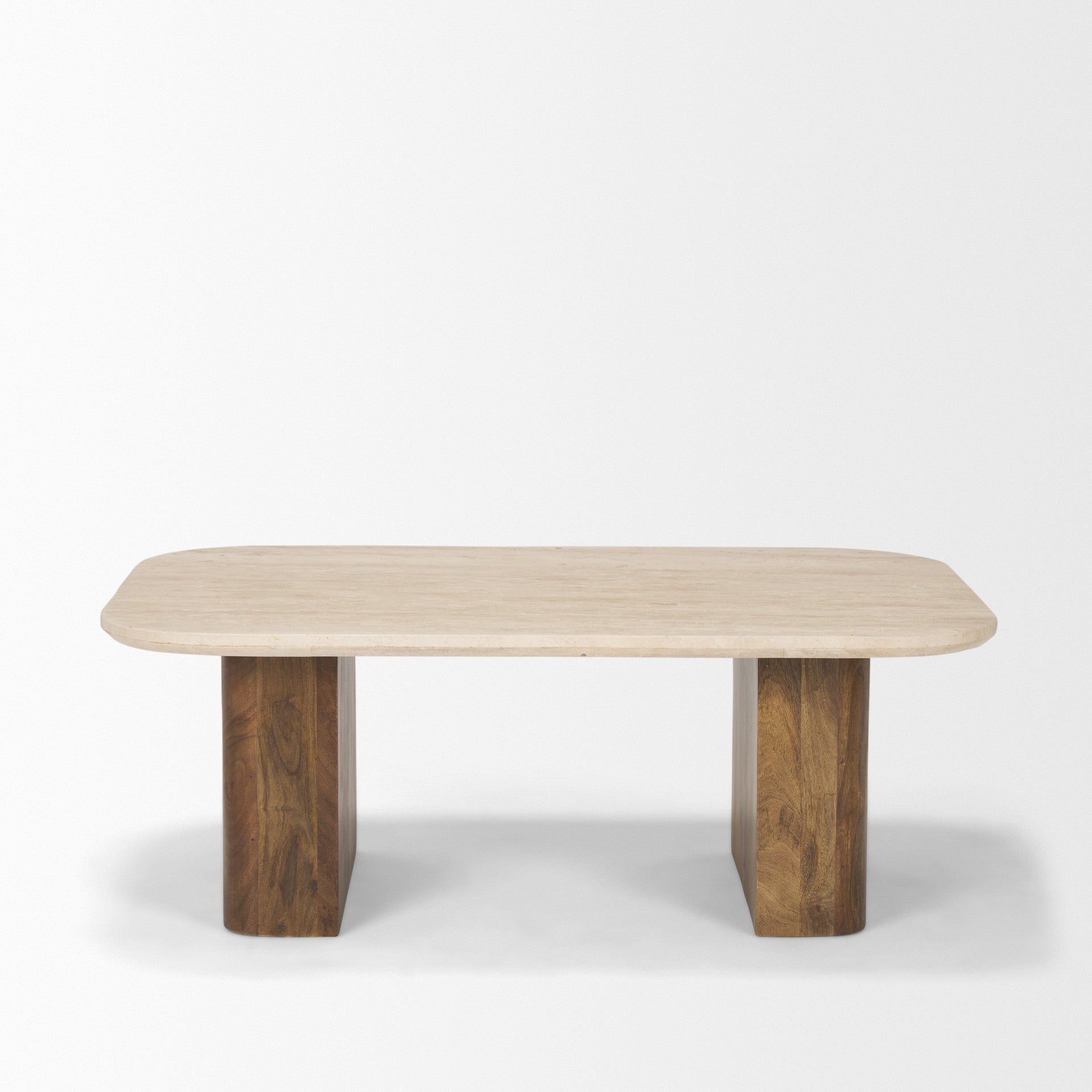 Beige stone coffee table with two matching pedestal legs and rounded rectangular shape