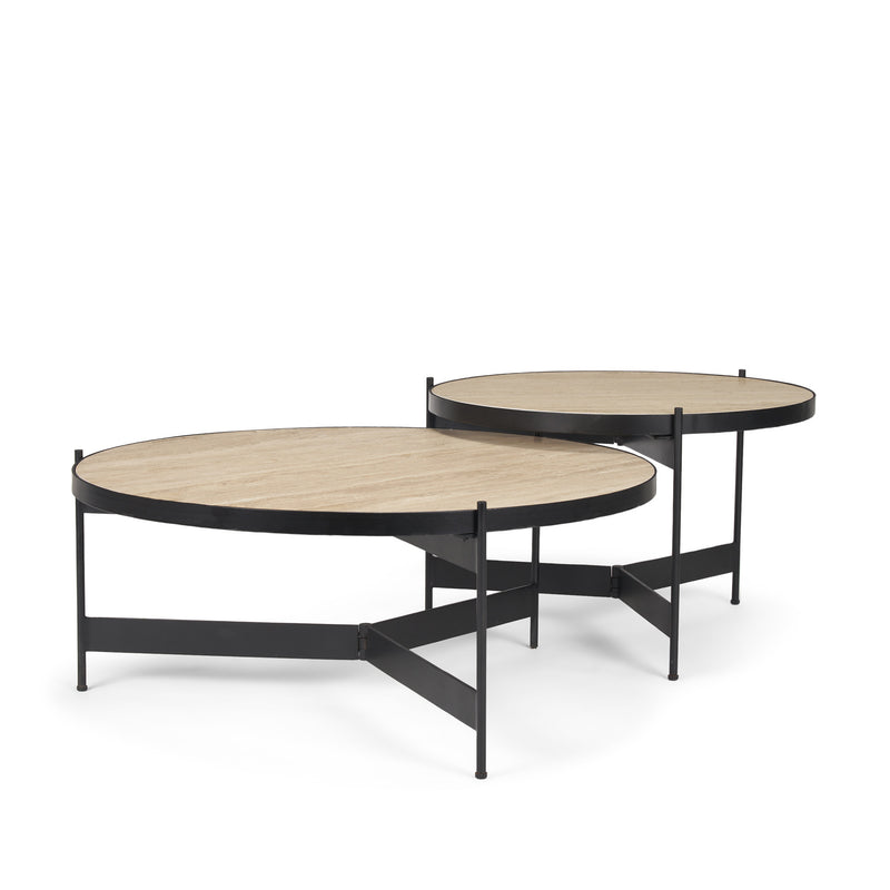 Two nested round coffee tables with beige stone-look surfaces and black iron bases