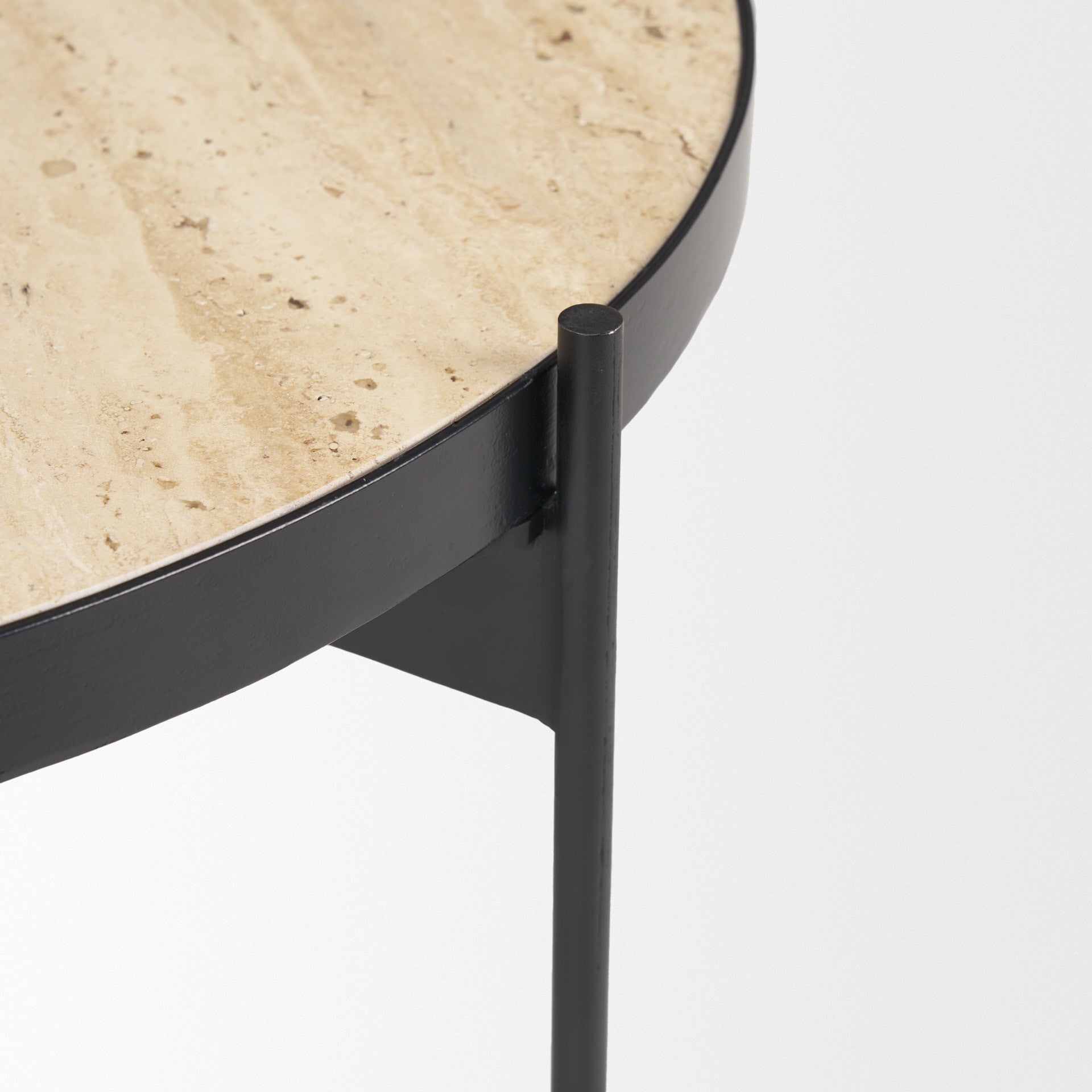 Beige stone-look tabletop edge with black iron frame detail