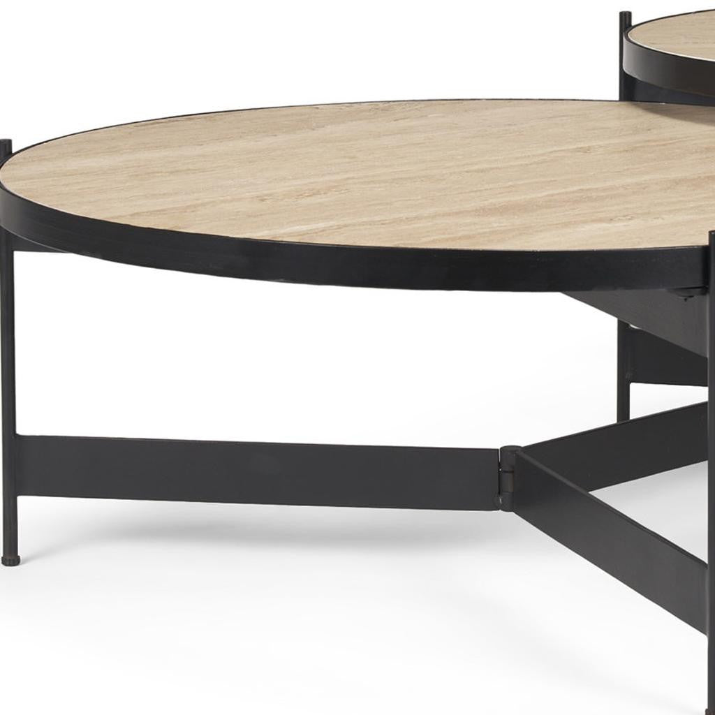Round beige stone-look coffee table top with black iron side frame