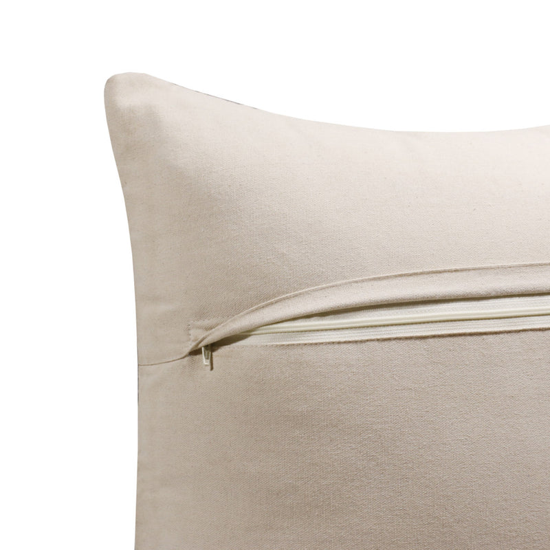 Beige cotton pillow cover with visible zipper along the back seam