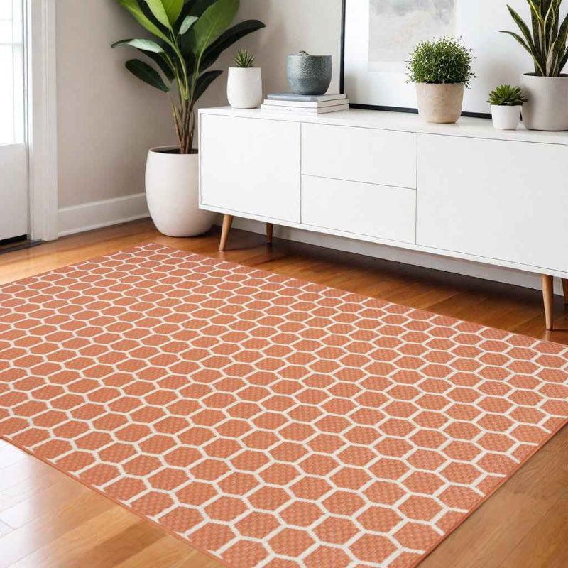 4' X 6' Coral And Ivory Geometric Indoor Outdoor Area Rug