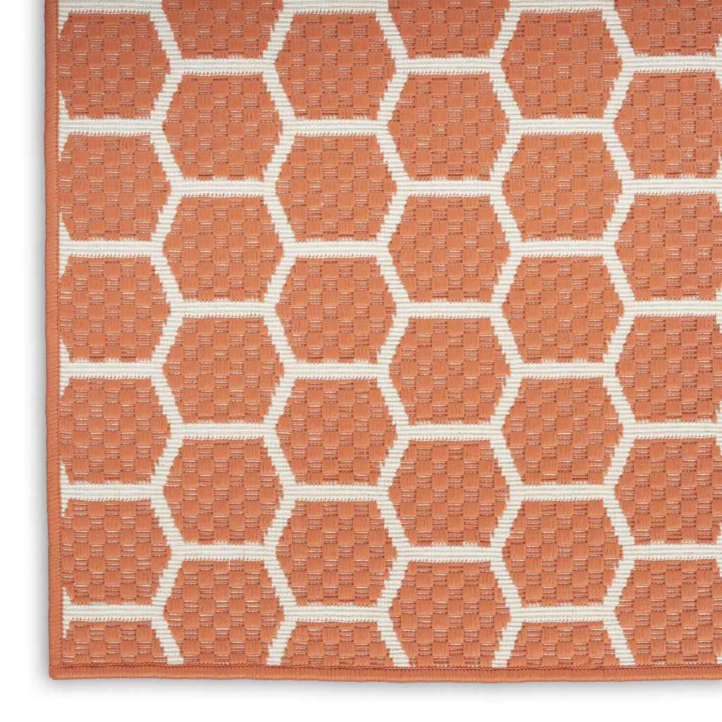 4' X 6' Coral And Ivory Geometric Indoor Outdoor Area Rug