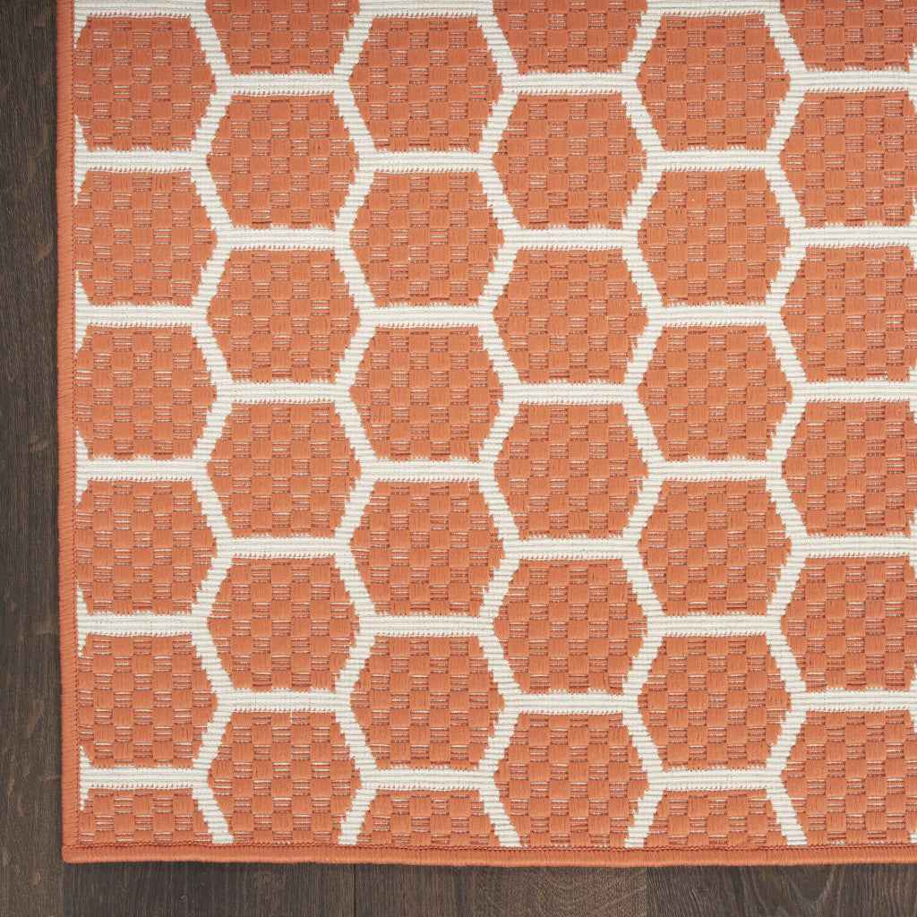 4' X 6' Coral And Ivory Geometric Indoor Outdoor Area Rug