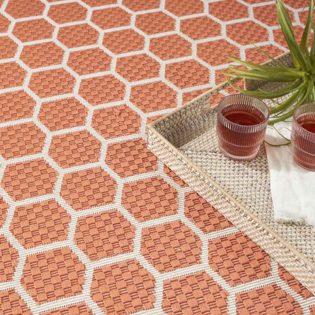 4' X 6' Coral And Ivory Geometric Indoor Outdoor Area Rug