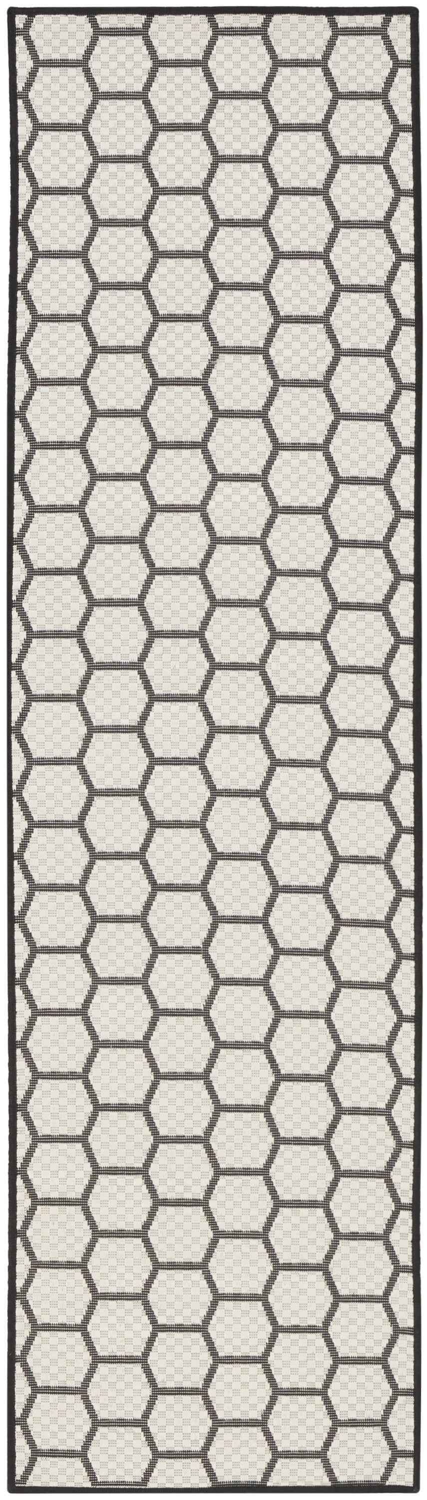 6' Black And Ivory Geometric Indoor Outdoor Area Rug