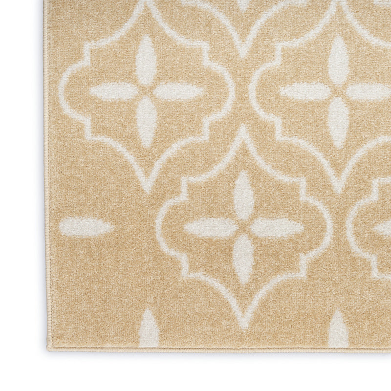 Beige and ivory geometric area rug with repeating floral trellis medallions.