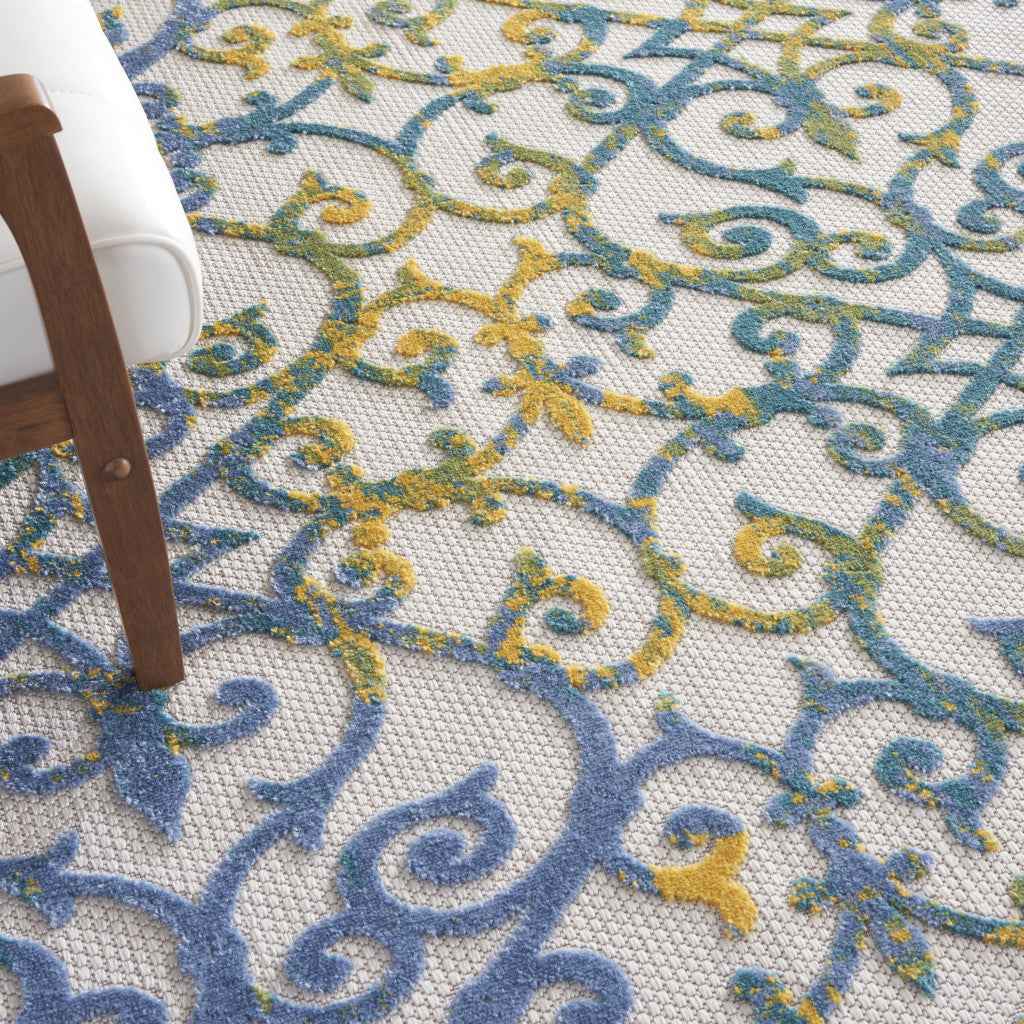 7' X 10' Ivory And Blue Indoor Outdoor Area Rug