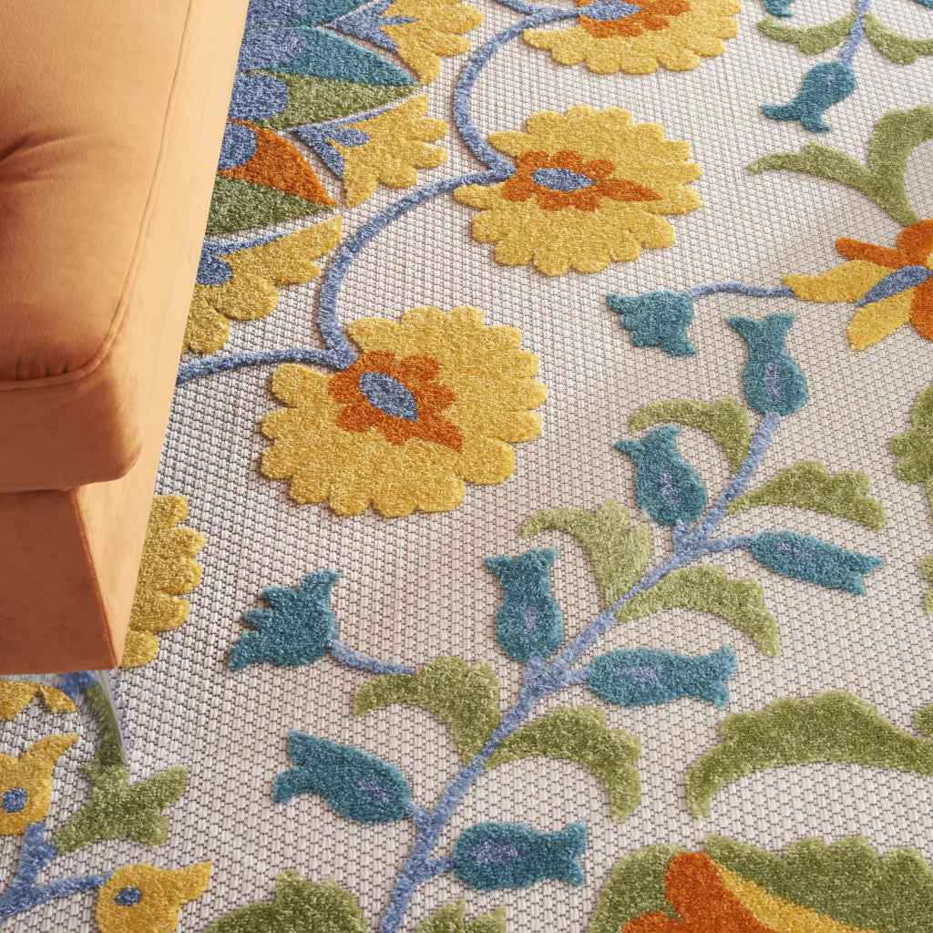 8' X 11' Ivory And Blue Floral Indoor Outdoor Area Rug