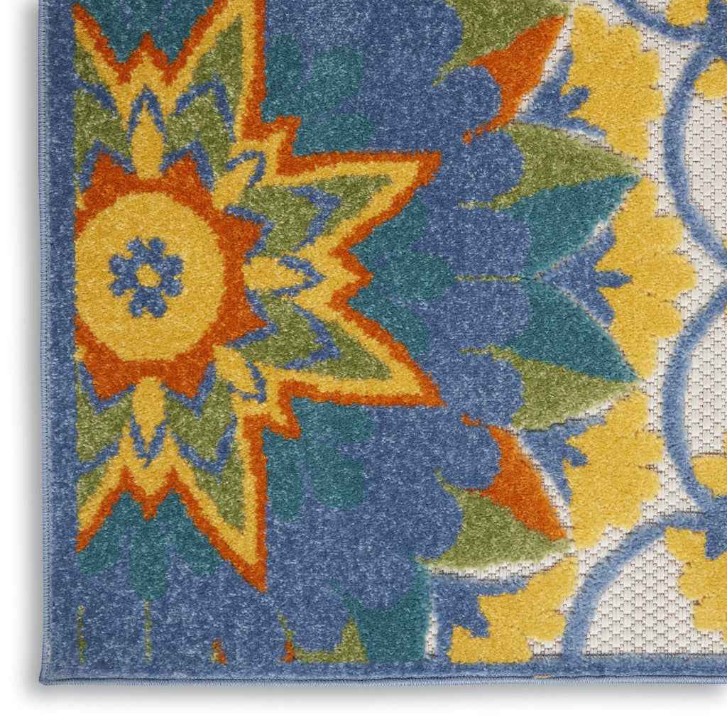 6' X 9' Ivory And Blue Floral Indoor Outdoor Area Rug