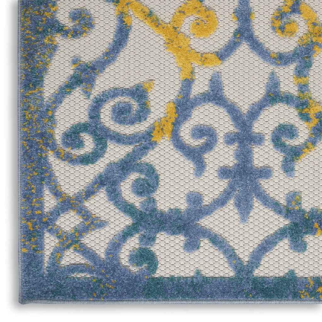 5' X 8' Ivory And Blue Indoor Outdoor Area Rug