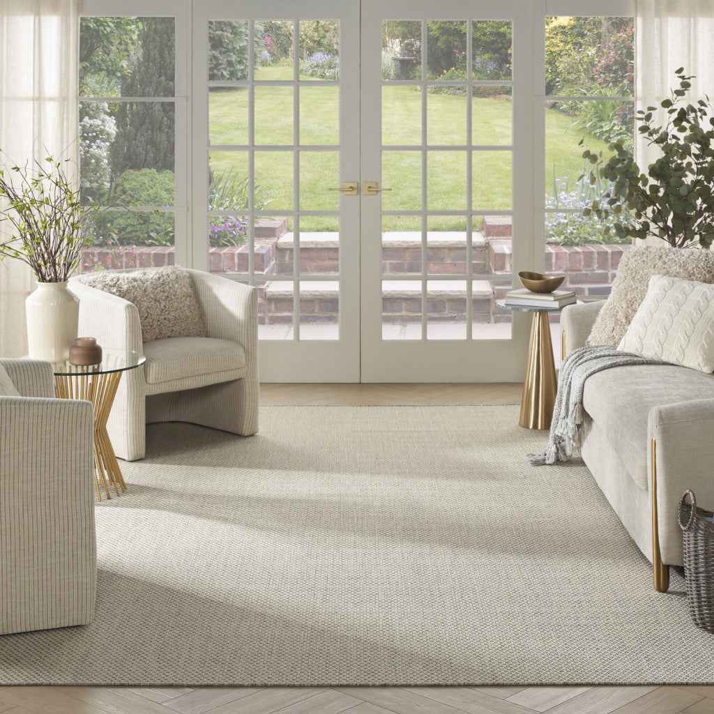 9' X 12' Ivory And Silver Indoor Outdoor Area Rug
