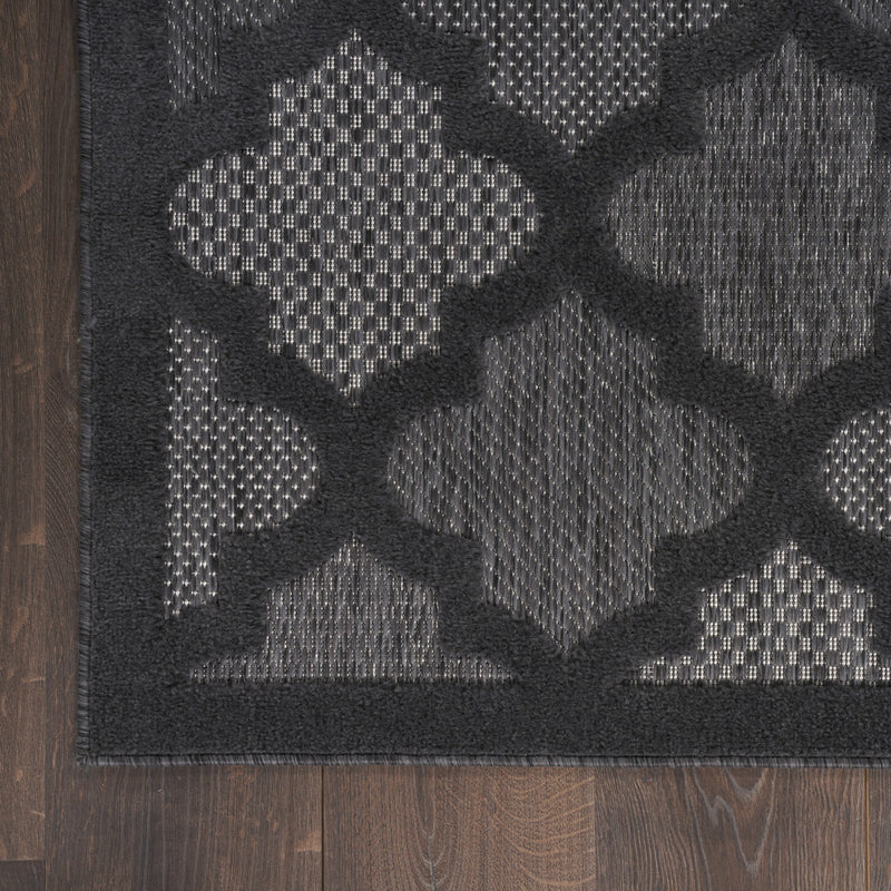 Charcoal and black trellis runner rug corner with diamond medallion pattern