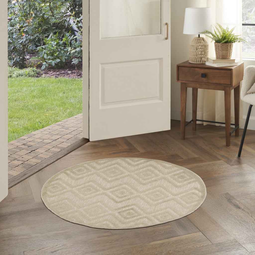 4' Cream And Beige Round Geometric Indoor Outdoor Area Rug