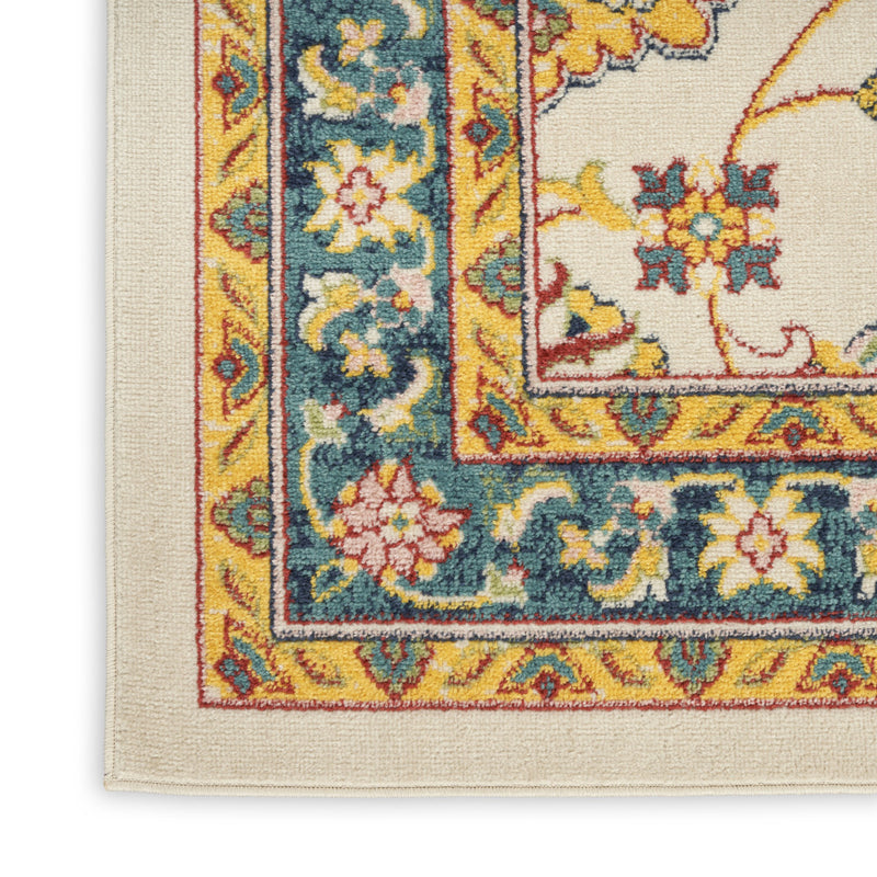 Ivory rug corner detail with blue floral scrollwork, gold trim, and red accents
