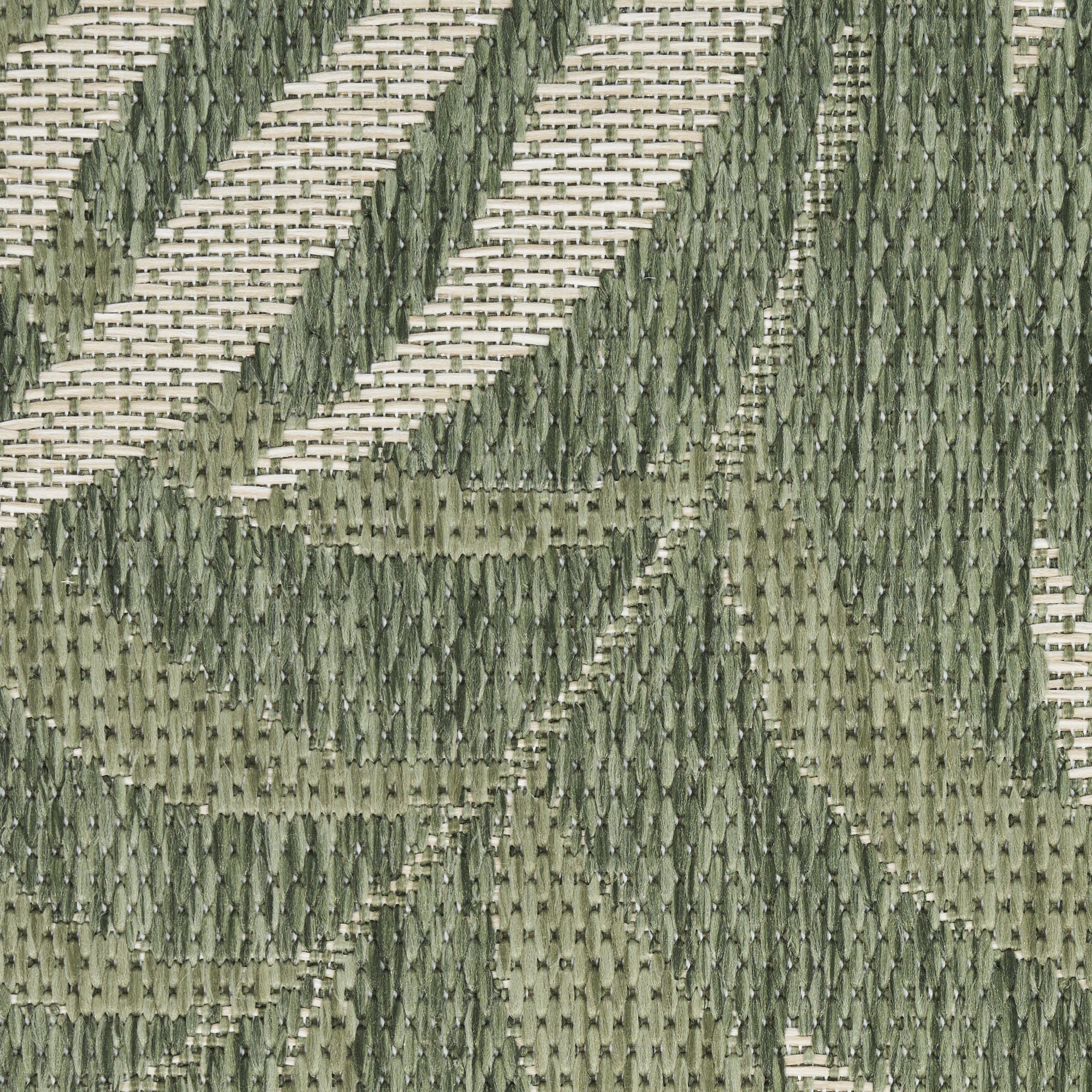 Green and ivory area rug with repeating vertical palm leaf motif in woven texture