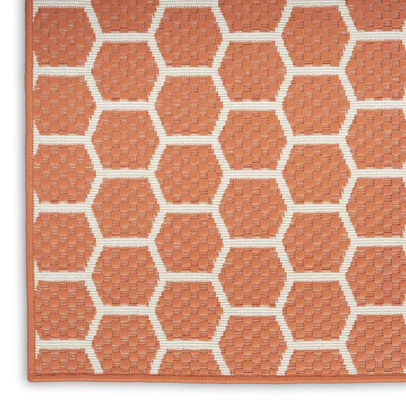 6' Coral And Ivory Geometric Indoor Outdoor Area Rug