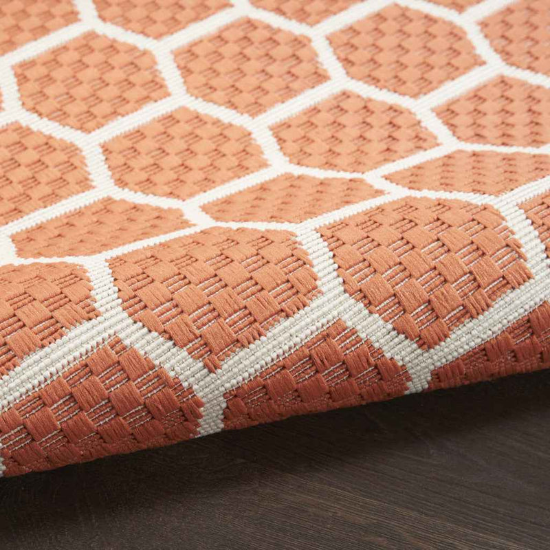 6' Coral And Ivory Geometric Indoor Outdoor Area Rug