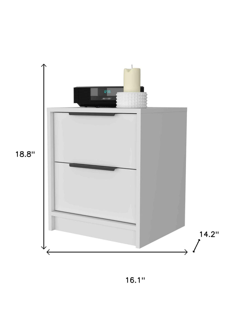 White wood nightstand with two drawers, black bar handles, and side dimensions.