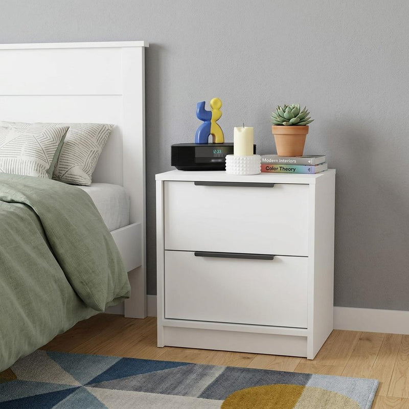 White wood nightstand with two drawers and black bar handles.
