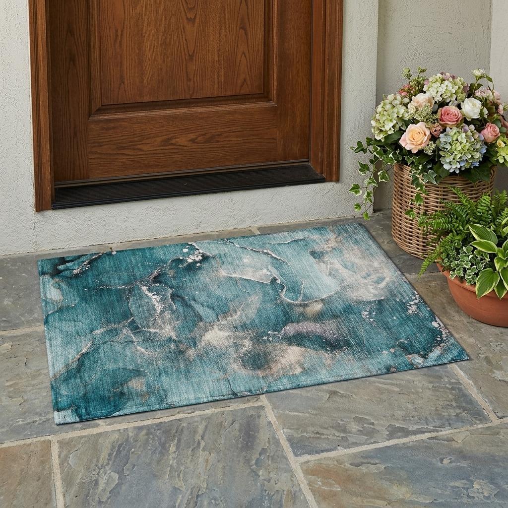 Teal abstract washable area rug with light beige distressed pattern, rectangular