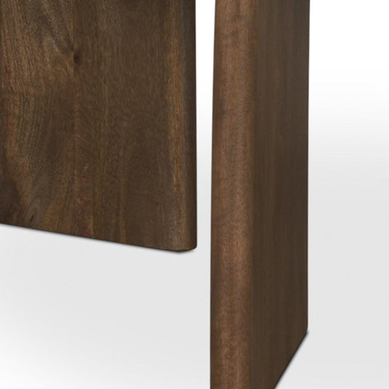 Close-up of dark brown wood table base with vertical side panel