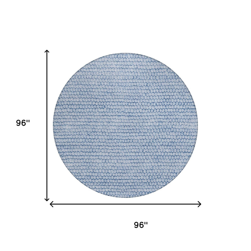 Round blue area rug, 96 in diameter, textured looped pebble pattern.